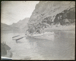 Boat No. 1, the "Bonnie Jean" in the upper end of the Grand Canyon. Snapshot by James Hogue, 1890. McDonald, Gibson, Kane, Stanton.
