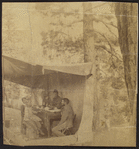 [An improvised dining room when we first reached Old Baldy (near San Bernadino, Calif.). RBS and family.]