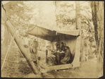 An improvised dining room when we first reached Old Baldy (near San Bernadino, Calif.). RBS and family.