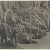 Dec. 21 Fr. camp #50. 3m. below. Portaging supplies after lining boat down rapid.