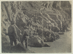 Dec. 21 Fr. camp #50. 3m. below. Portaging supplies after lining boat down rapid.