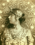 Ruth St. Denis in first costume for Radha.  Bust portrait.