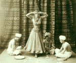 Ruth St. Denis with native Hindus in first costume for Radha.
