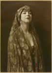 Ruth St Denis, in costume, no specific dance.
