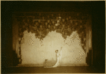 Ruth St Denis in Greek Veil Plastique with background drop used for vaudeville tour.