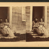 Portrait of an unidentified couple sitting in the doorway of a house, Casco Bay, Maine.