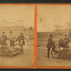 View of 4 men with tools and a railroad hand car.