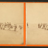 Group portrait with a boat on the beach.