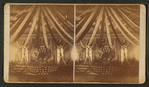 View of an unidentified interior decorated with streamers, flags, etc.