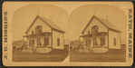 People (adults and children) posed on the porch of their cottage, Bath, Maine.