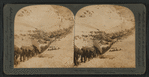 Miners and packers climbing the "Golden Stair" trail, Chilkoot Pass, Alaska