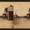 View of a road, church and three men standing on in front of a building, California.