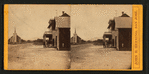 View of a road, church and three men standing on in front of a building, California.