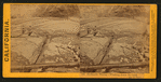 Hydraulic Mining - washing down the bank into the sluice.