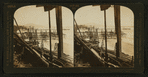 Pumping oil from the sea - oil wells in the surf of Summerland, California, U.S.A.