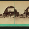 Scenery of house, horse, man standing, women and child standing.