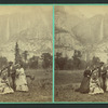 Group of tourists, with Yosemite Falls as backdrop.
