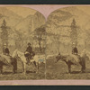 Tourists on horseback.