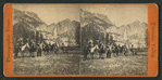 Tourists on horseback.