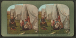 A family of refugees waiting for dinner in camp at Ft. Mason after the San Francisco disaster.