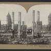 City Hall, Photographer in foreground. Tall brick chimneys left standing.