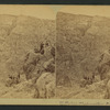 View of men on the rocks.