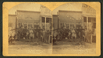 A group posed in front of "The Capitol" at Silver Creek.