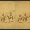 Three men on horseback.