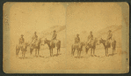 Three men on horseback.