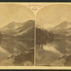 Elk Lake and snow mass, Elk Mountains.