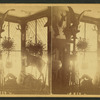 An interior of a sportmen's store showing hunting trophies.
