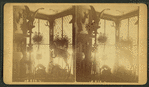 An interior of a sportmen's store showing hunting trophies.