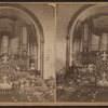 View of an altar and the organ.