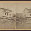 [View of a house that has been lifted off its foundation.]
