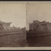 View of a damaged house with collapsed roof.