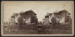 View of a collapsed house.