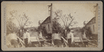 View of residents surveying the damage.