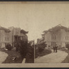 View of a damaged house with collapsed roof.