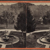 View of a park or garden with a fountain.