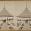 A gazebo at the end of a pier.