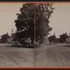 View of a street in Southington (with a church in background).