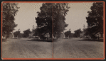 View of a street in Southington (with a church in background).
