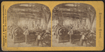 Men in an unidentified mill showing belt driven equipment.