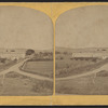 A farm with large barns.