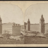 A large mill building with two towers.
