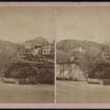 View of the centennial flood innudating the railroad bridge.