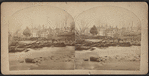 View of a flood and destroyed bridge.