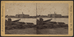 View of the river and industrial building at the other side.