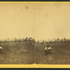 Issuing rations. (Showing an Indian with a pipe in his hand in the foreground.)