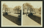 View of White House. Men at work in the gardens.
